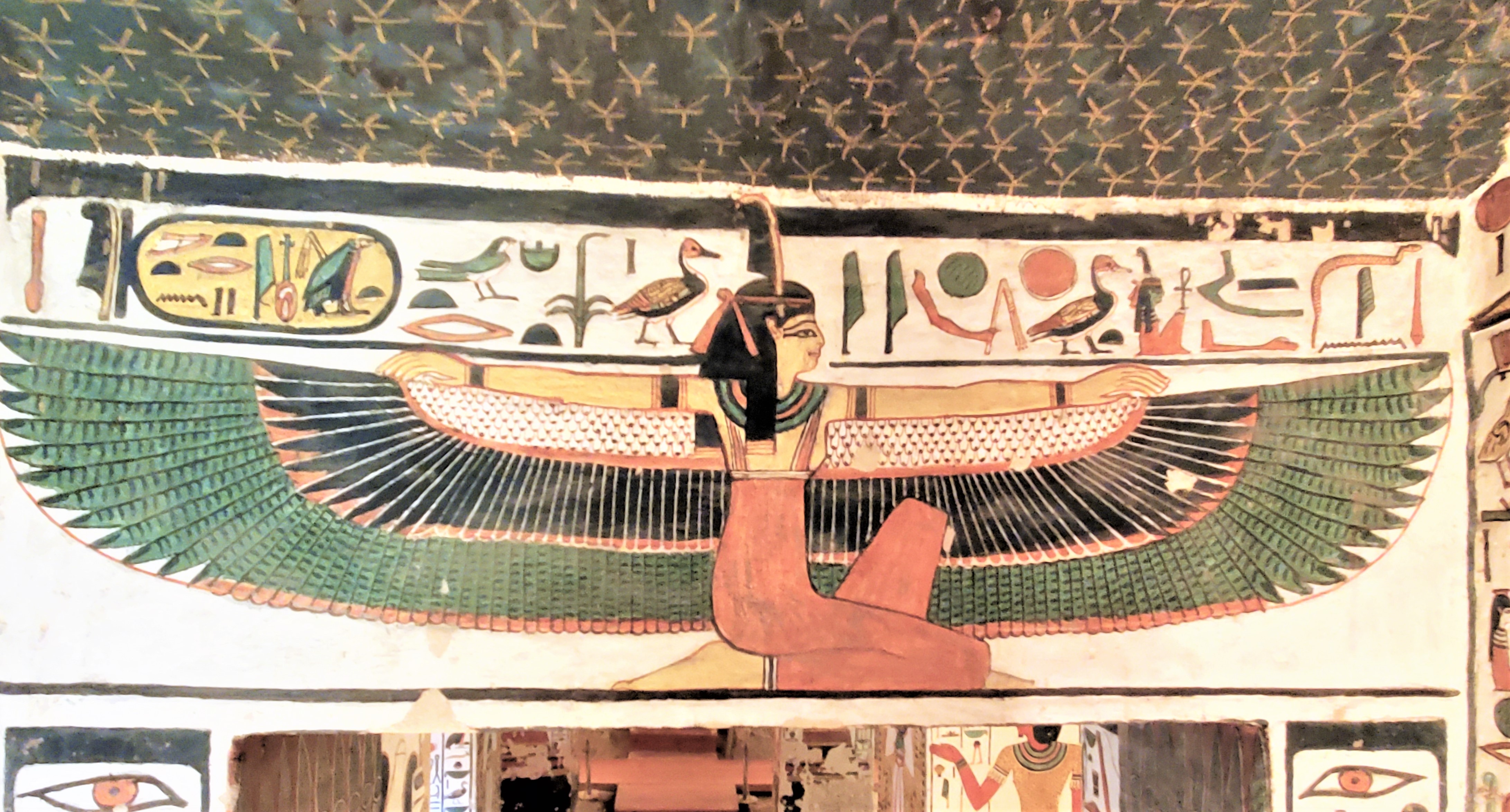 Goddess Ma'at colorfully painted above the lintel in Queen Nefertari's Tomb. Depicted with vulture wings on her arms.