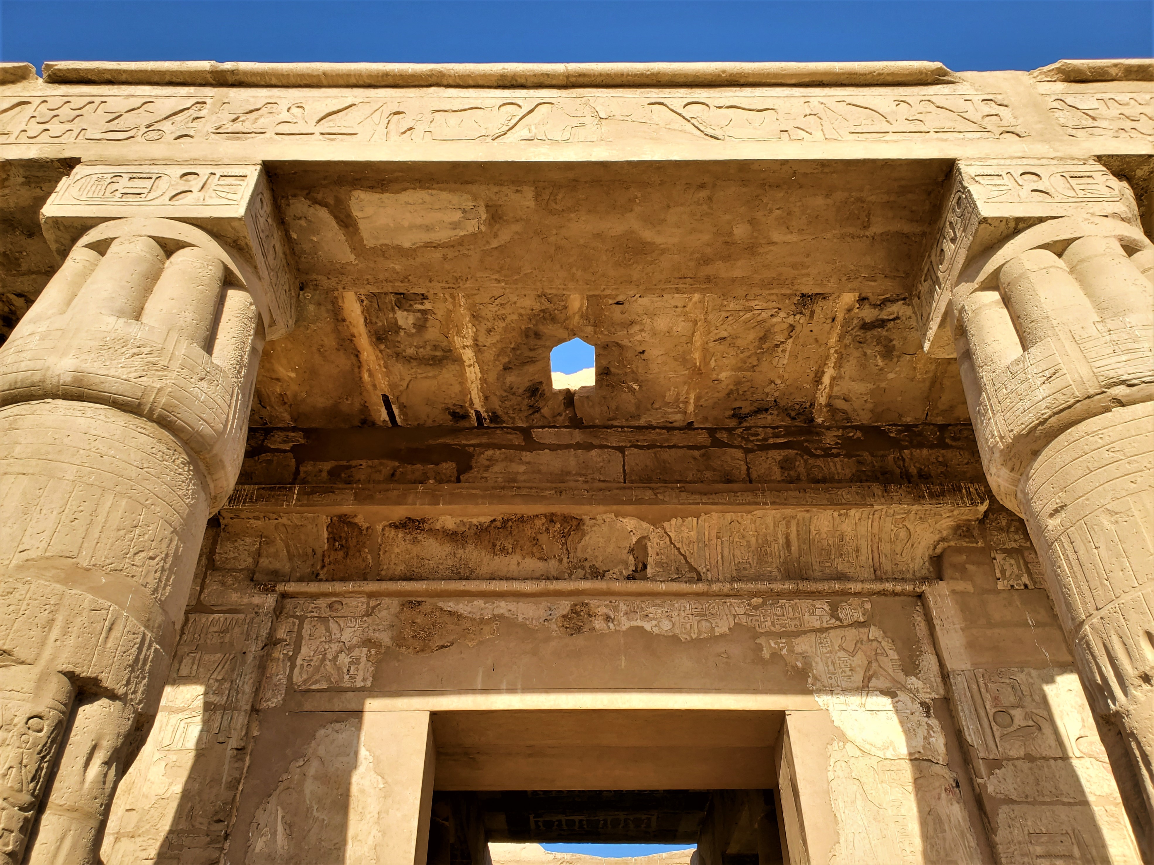 entryway of King Seti 1 mortuary temple with an interesting hole above the door.